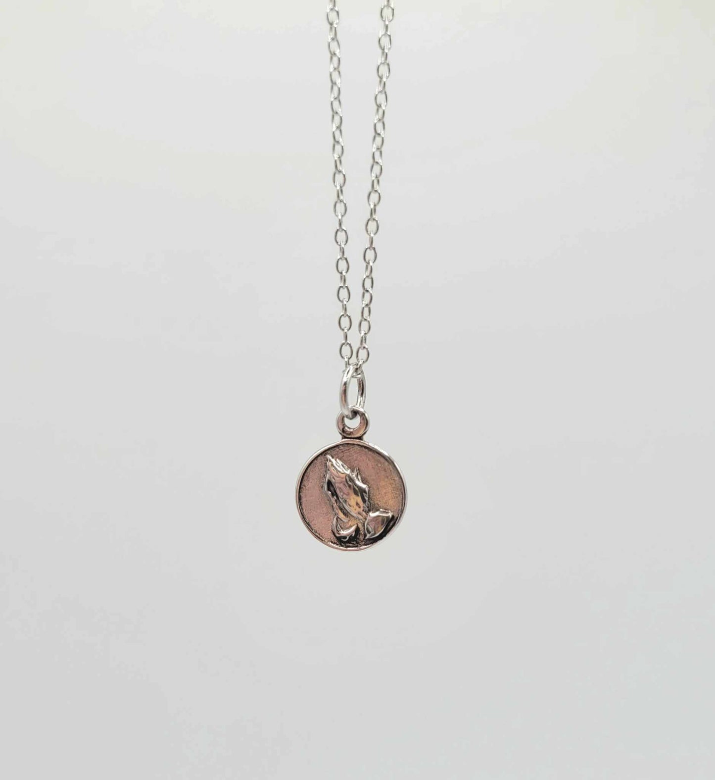 Jolie Children's Sterling Silver Necklace with Praying Hands Pendant