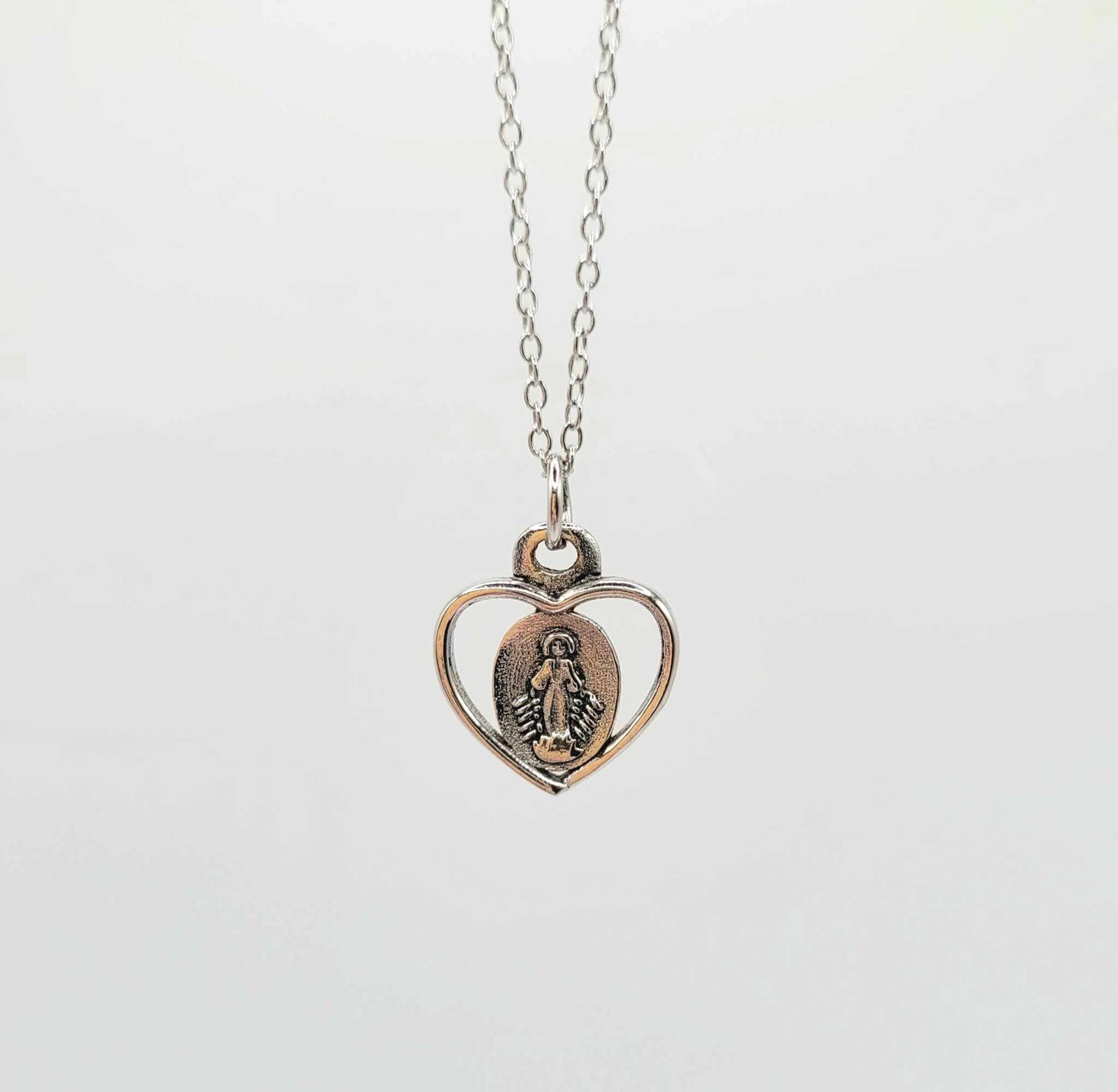 Jolie Children's Sterling Silver Necklace with Saint Mary Heart Pendant